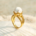 Orlisse bold gold ring with a luminous raised pearl, 316L stainless steel — Crown Crest Jewel